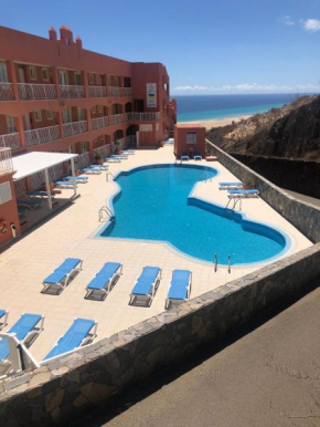 Beach front apartment with stunning ocean views!